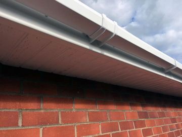 close up view of gutter installation by d richards roofing